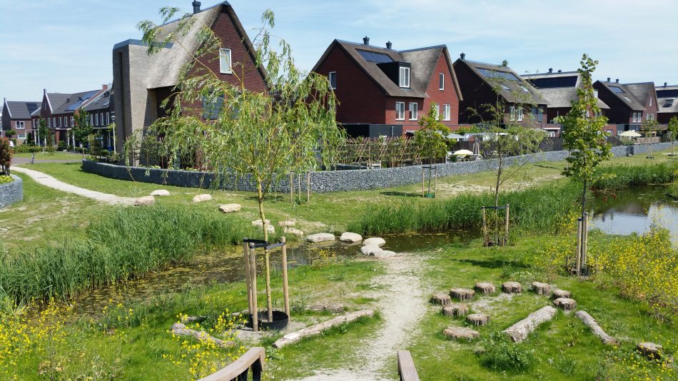 How can we accelerate the process of ensuring that our built environment is climate resilient?